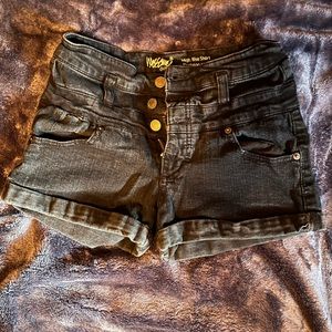 Black cuffed shorts.